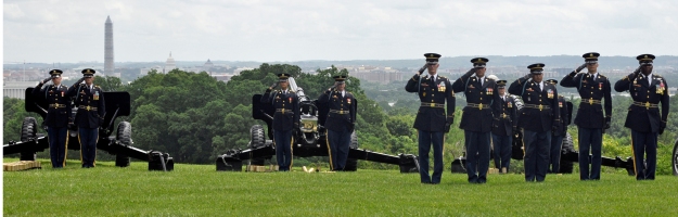 Soldiers of the PSB salute during the national anthem on July 4.